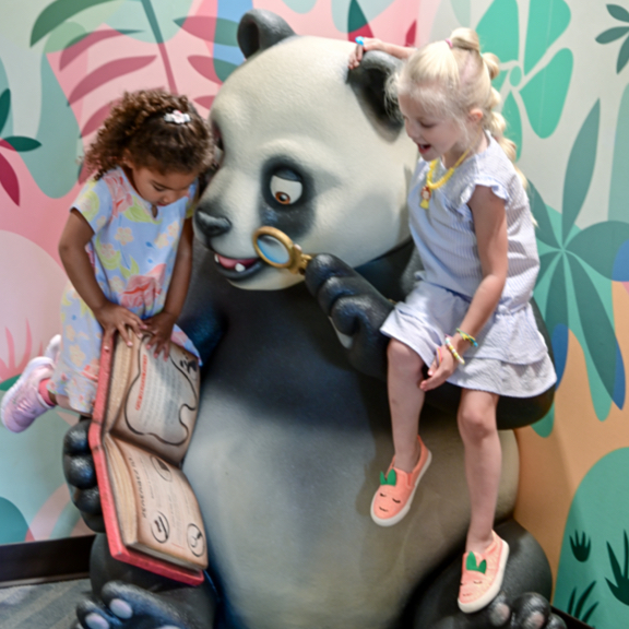 Kids Playing with Panda